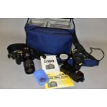 A NIKON D100 DIGITAL SLR CAMERA with charger, one good battery and a discharged battery, a Nikkor AF