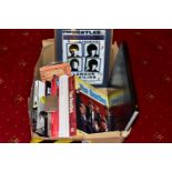 EIGHT BOOKS AND MERCHANDISE PERTAINING TO THE BEATLES and attributing artist including Imagine