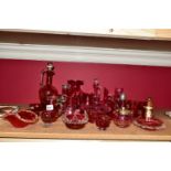 A GROUP OF CRANBERRY GLASS ITEMS, including a footed jug having Mark W MFM with cranberry insert,