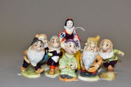 BESWICK SNOW WHITE AND THE SEVEN DWARFS SET, style one, comprising Dopey no1325, Happy no1326,