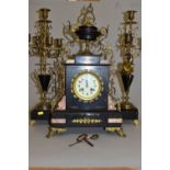 A LATE 19TH CENTURY BLACK SLATE, MARBLE AND GILT METAL CLOCK GARNITURE, the clock with urn shaped