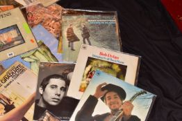 A COLLECTION OF TWENTY FOLK MUSIC LPs by artists such as Cat Stevens, Bob Dylan, Simon and Garfunkel