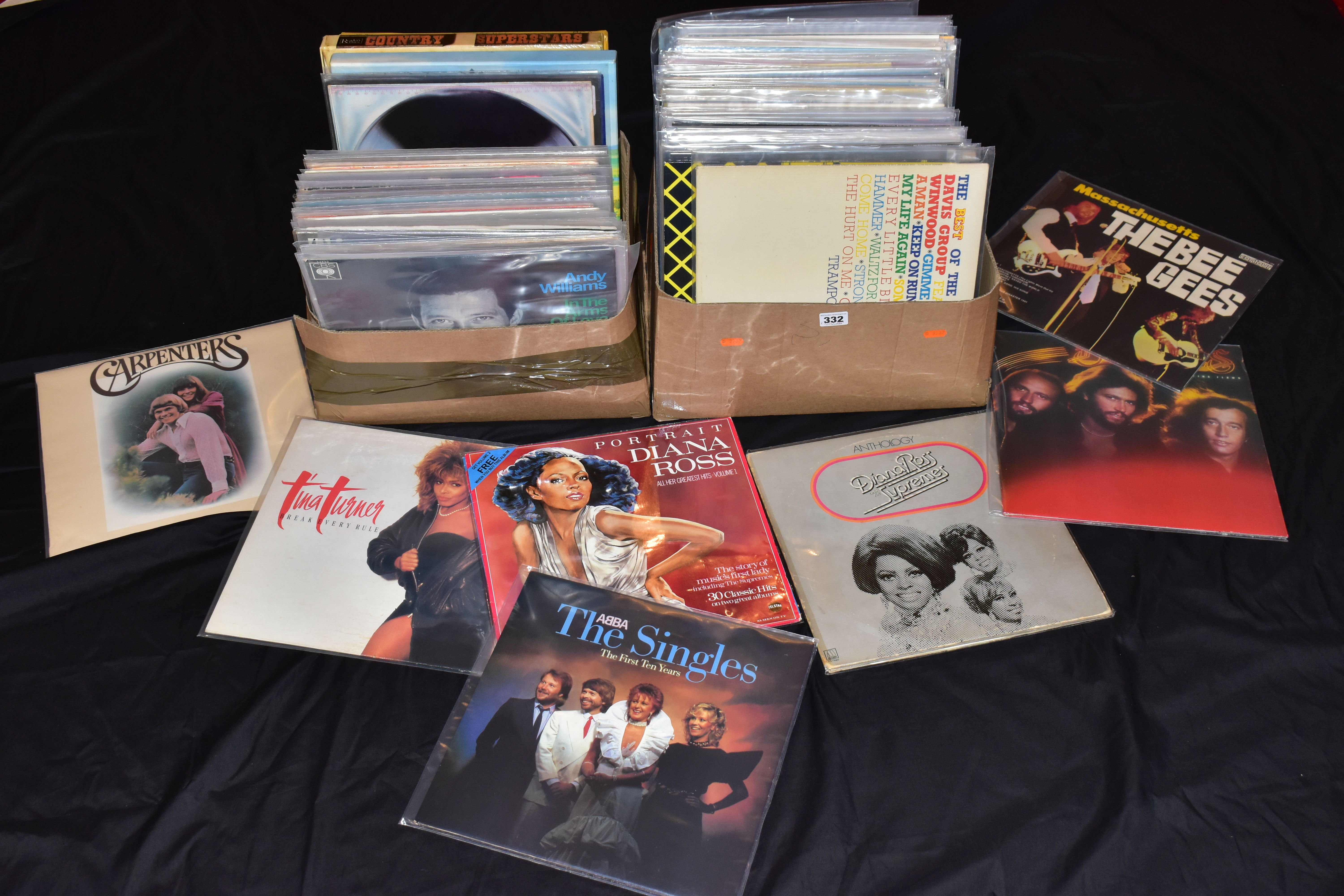 TWO TRAY CONTAINING OVER ONE HUNDRED LPs by artists such as Billy Joel, Abba, the Travelling