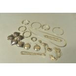 A BAG OF ASSORTED SILVER AND WHITE METAL JEWELLERY, to include a silver charm bracelet suspending