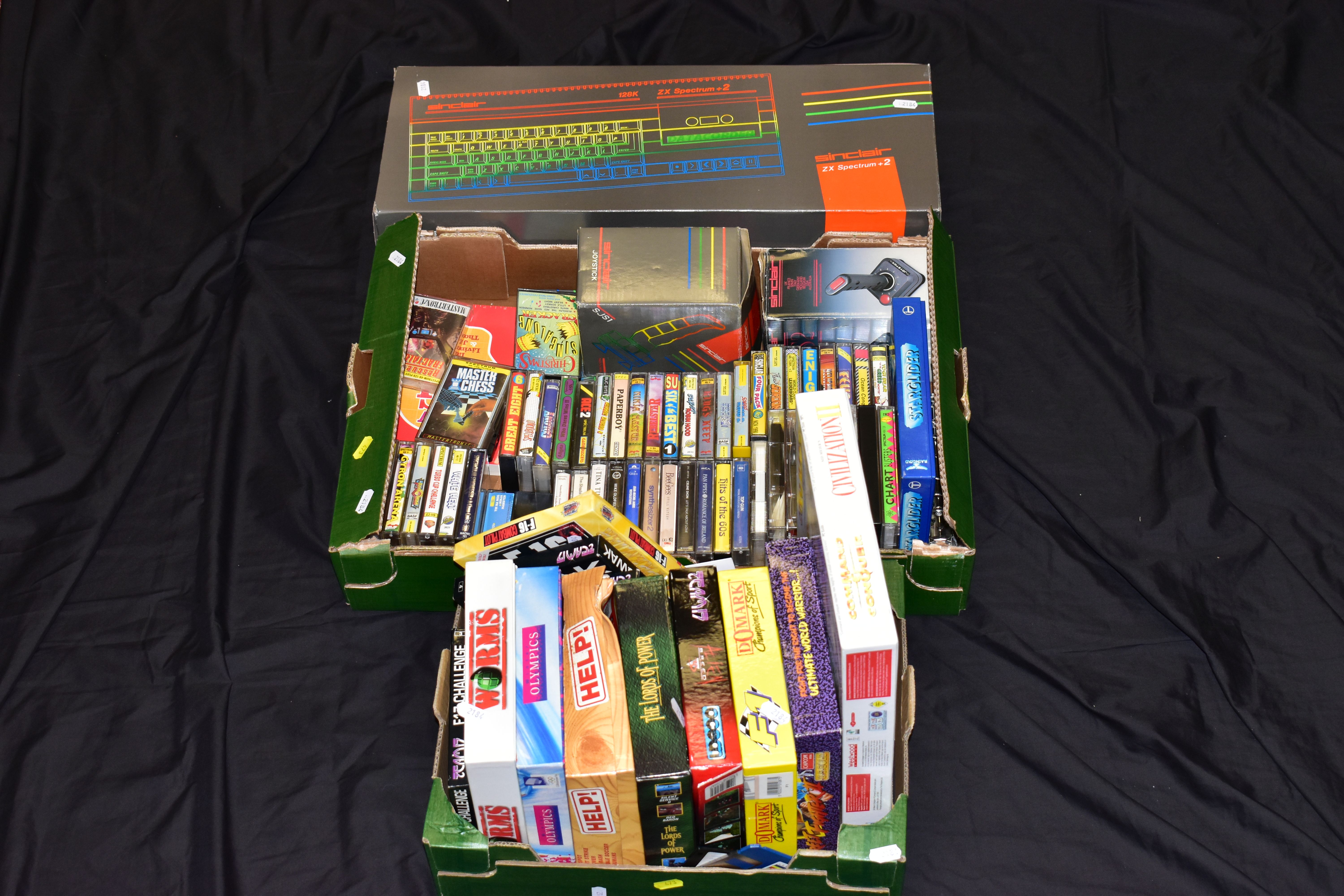 A BOXED SINCLAIR ZX SPECTRUM +2 VINTAGE COMPUTER with all packaging, power supply, a boxed