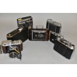 SIX FOLDING CAMERAS FROM KODAK AND ENSIGN comprising of a Regent 1, a Special 1, a Commando, an Auto