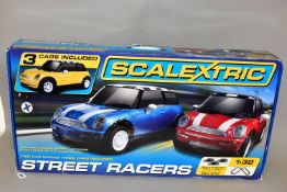 A BOXED SCALEXTRIC STREET RACERS SET, No.C1208, box has been opened and has minor damage but