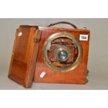 A THORNTON PICKARD THE SANDERSON PLATE CAMERA in mahogany and brass fitted with a Taylors series 3