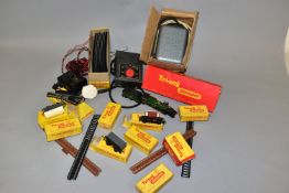 A QUANTITY OF BOXED AND UNBOXED TRI-ANG TT GAUGE MODEL RAILWAY ITEMS, to include unboxed Castle