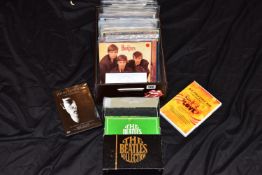 THE BEATLES AND CONTRIBUTING ARTISTS including Twenty Eight singles and EPs and a Black box