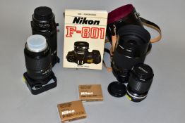 A TRAY CONTAINING NIKON CAMERA LENSES including a Reflex 500mm f8 Mirror lens with CL-23 tube, an AF