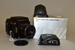 A MAMIYA RB67 PROFESSIONAL S MEDIUM FORMAT CAMERA with a boxed PD Prism Finder and standard