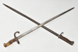 TWO EUROPEAN RIFLE BAYONETS, one French with very feint details along top of blade, the other has no