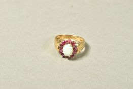 A 9CT GOLD OPAL AND PINK SAPPHIRE CLUSTER RING, the central oval opal cabochon within a circular