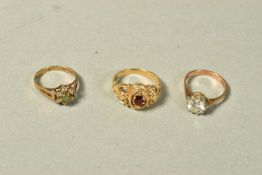 THREE 9CT GOLD GEM SET RINGS, the first set with a colourless circular cubic zirconia, the second