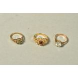 THREE 9CT GOLD GEM SET RINGS, the first set with a colourless circular cubic zirconia, the second