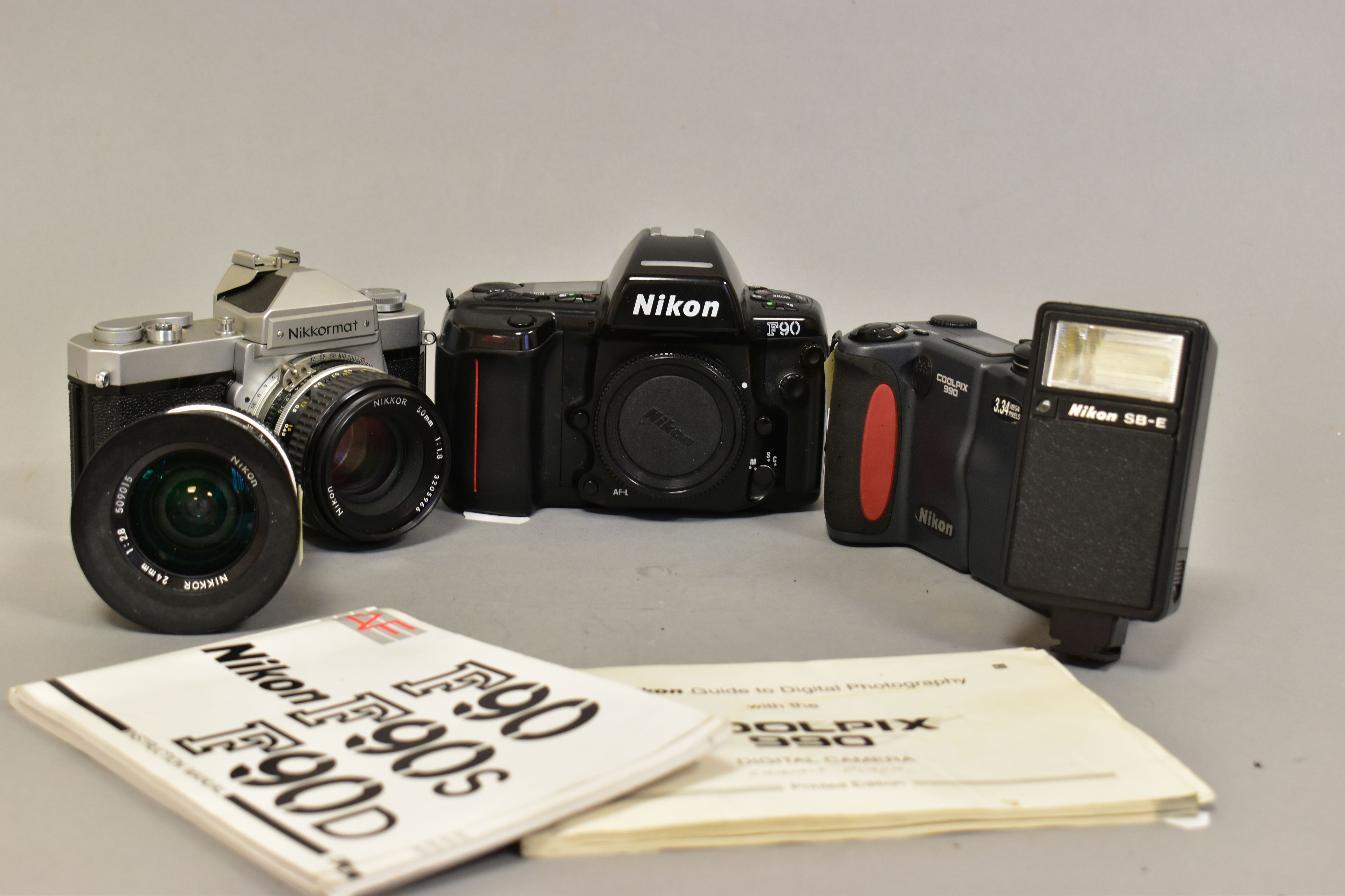 A NIKKORMAT FT FILM SLR CAMERA fitted with a 50mm f1.8 lens, a 24mm f2.8 lens, a F90 film SLR