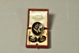 A LATE VICTORIAN MEMORIAL BROOCH AND A PAIR OF EARRINGS, the brooch of oval outline, the oval onyx