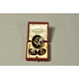 A LATE VICTORIAN MEMORIAL BROOCH AND A PAIR OF EARRINGS, the brooch of oval outline, the oval onyx