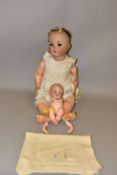 A SCHUTZMEISTER & QUENDT BISQUE HEAD DOLL, nape of neck marked '301 Jeanette 14' with the S & Q logo