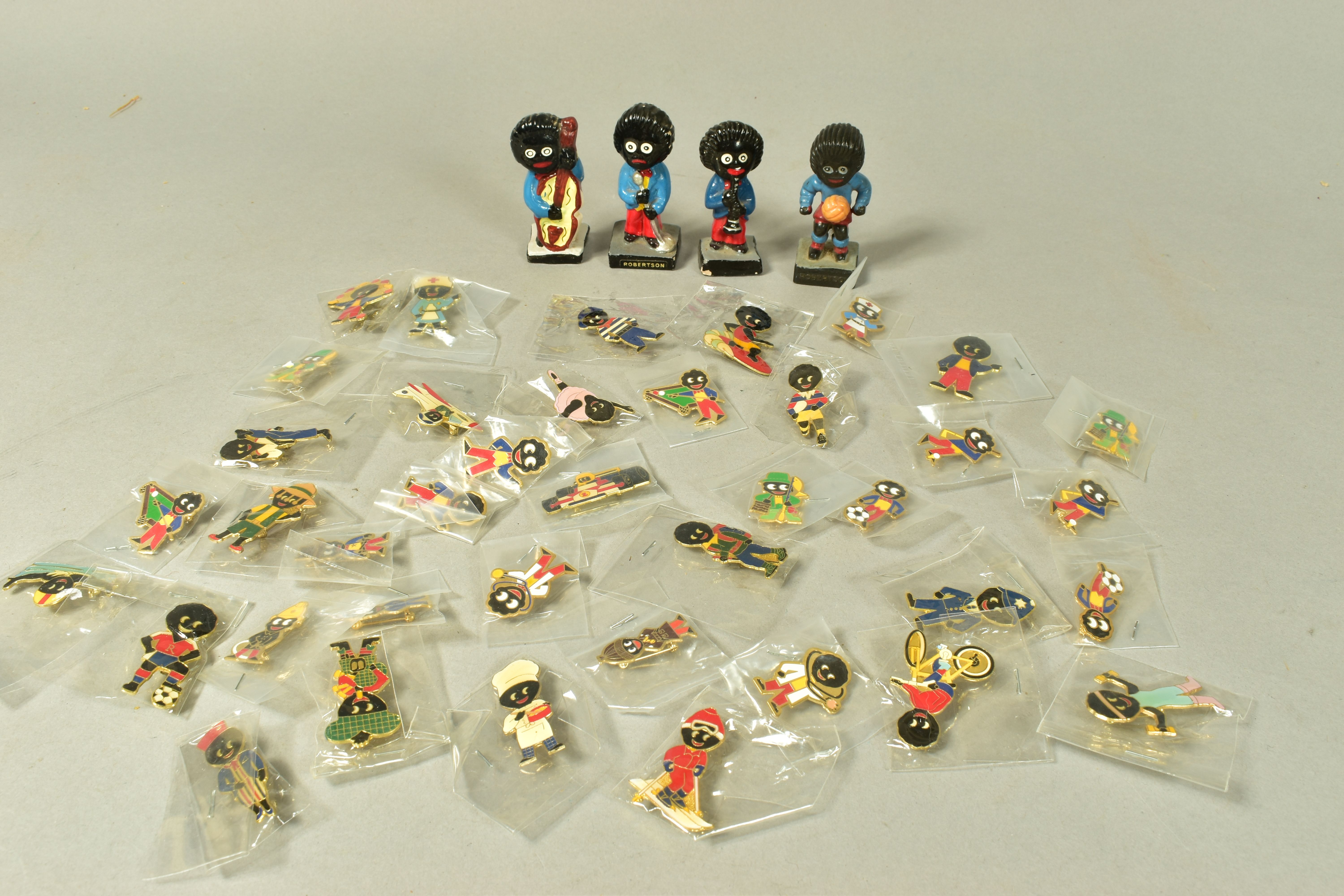 A BOX OF ASSORTED 'ROBERTSONS' PIN BADGES AND FIGURES, to include eighteen trade pins of various