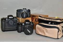 A NIKON D1 FULL FORMAT DIGITAL SLR CAMERA, two Nikon and two aftermarket batteries with charger, a