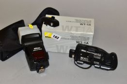 A NIKON SB-800 SPEEDLIGHT with SS600 soft case and a boxed WT-1a wireless transmitter