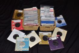 TWO BASKETS CONTAINING OVER ONE HUNDRED AND FIFTY 7in SINGLES AND EPs from Artists such as Canned