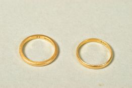 TWO 22CT GOLD BAND RINGS, both of plain design, both with 22ct hallmarks, widths 2mm, ring sizes K