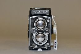 A ROLLEIFLEX 3.5B TLR CAMERA with 75mm lenses one a f3.5 Tessar the other a f2.8 Heidosmat with lens