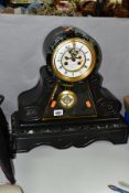 A LATE 19TH CENTURY BLACK SLATE AND MARBLE MANTEL CLOCK, the white enamel dial in a drum shaped