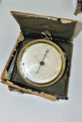 A LATE 19TH CENTURY ANEROID BAROMETER IN A DISTRESSED PRESENTATION CASE, silvered dial, the