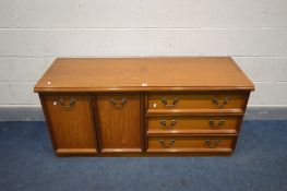 A MEREDEW TEAK SIDEBOARD with three drawers, width 135cm x depth 48cm x height 43cm, along with a