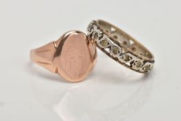 A 9CT ROSE GOLD SIGNET RING AND A FULL ETERNITY RING, the signet ring of an oval form (signs of