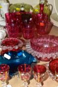 A GROUP OF CRANBERRY, URANIUM GLASS AND OTHER GLASS WARES, to include twenty three pieces, a late