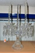 A WATERFORD CRYSTAL TWO BRANCH CANDELABRA, with a central tapering needle flanked by two branches