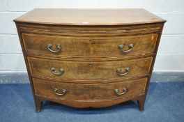 A GEORGIAN MAHOGANY AND CROSSBANDED BOWFRONT CHEST OF THREE LONG DRAWERS, with a brushing slide,