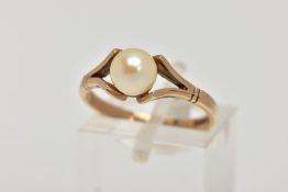 A 9CT GOLD RING, designed with a single cultured pearl, bifurcated shoulders, plain polished band,