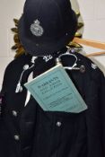 POLICE INTEREST, A POLICE TUNIC, HELMETS, PHOTOGRAPHS, HANDCUFFS ETC, comprising a Warwickshire