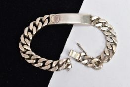 A SILVER IDENTIFICATION BRACELET, vacant panel, fitted onto a curb link bracelet, push pin