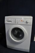 A BOSCH CLASSIXX 1400 EXPRESS WASHING MACHINE (PAT pass and powers up)