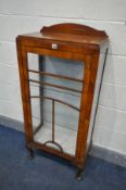 AN ART DECO WALNUT SINGLE DOOR CHINA CABINET, on cabriole legs, width 57cm x depth 31cm x height