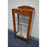 AN ART DECO WALNUT SINGLE DOOR CHINA CABINET, on cabriole legs, width 57cm x depth 31cm x height