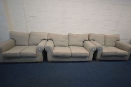 A MULTIYORK OATMEAL UPHOLSTERED THREE PIECE LOUNGE SUITE, comprising a large two seater settee,