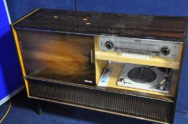 A GRUNDIG STEREO CONCERT CABINET MERANO in a mahogany casing (untested) due to cable issues