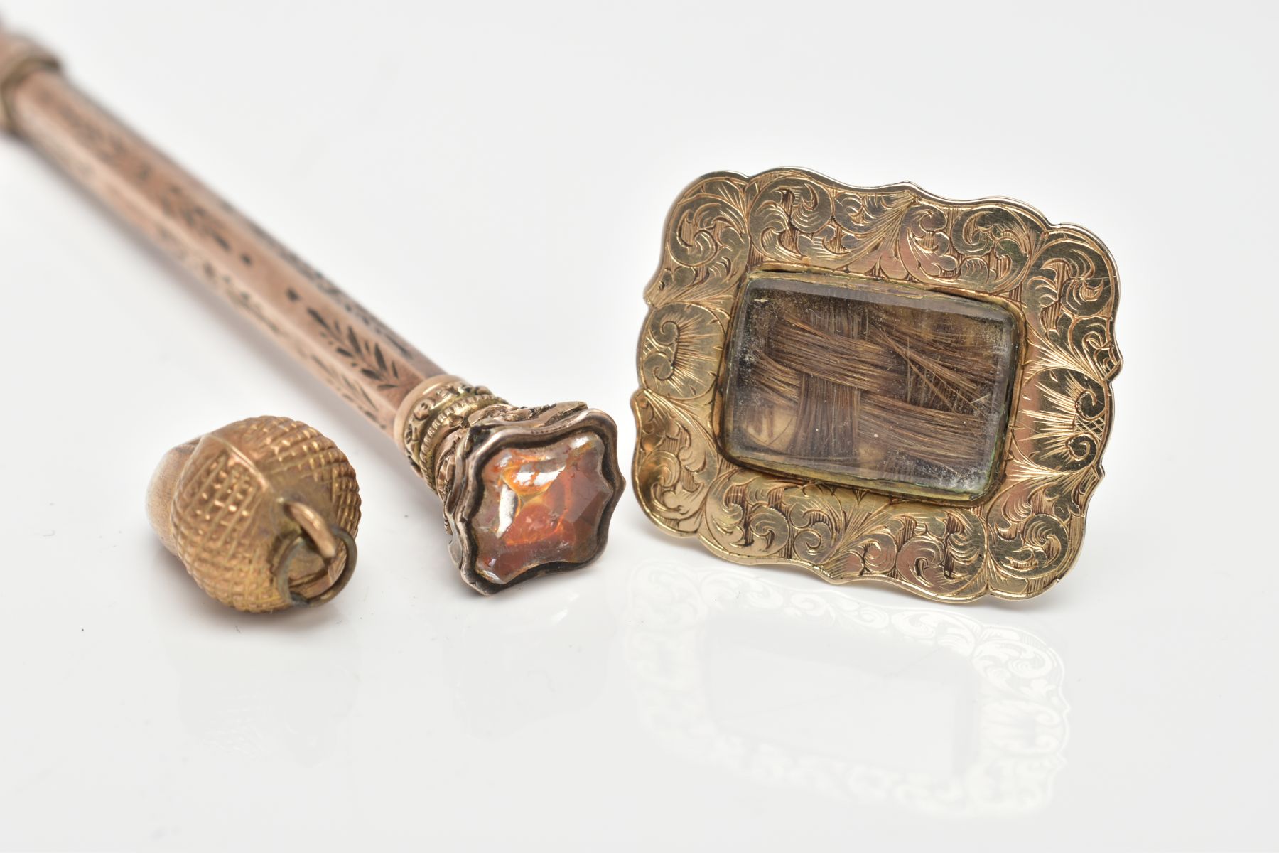 A VICTORIAN GOLD MOURNING BROOCH, PENCIL AND ACORN PENDANT, one gold mourning brooch with - Image 2 of 5