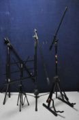 A SELECTION OF MUSIC STANDS to include three microphone stands a guitar stand and a sheet music