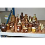 APPROXIMATELY SIXTY STONEWARE BOTTLES AND POTS, to include a J Graf Stoob Austrian stoneware