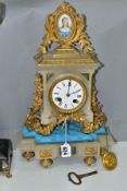 A LATE 19TH CENTURY ALABASTER AND GILT METAL MANTEL CLOCK, with foliate and oval surmount inset with
