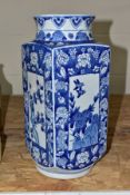 A 20TH CENTURY CHINESE BLUE AND WHITE PORCELAIN VASE, circular neck over a square body, circular